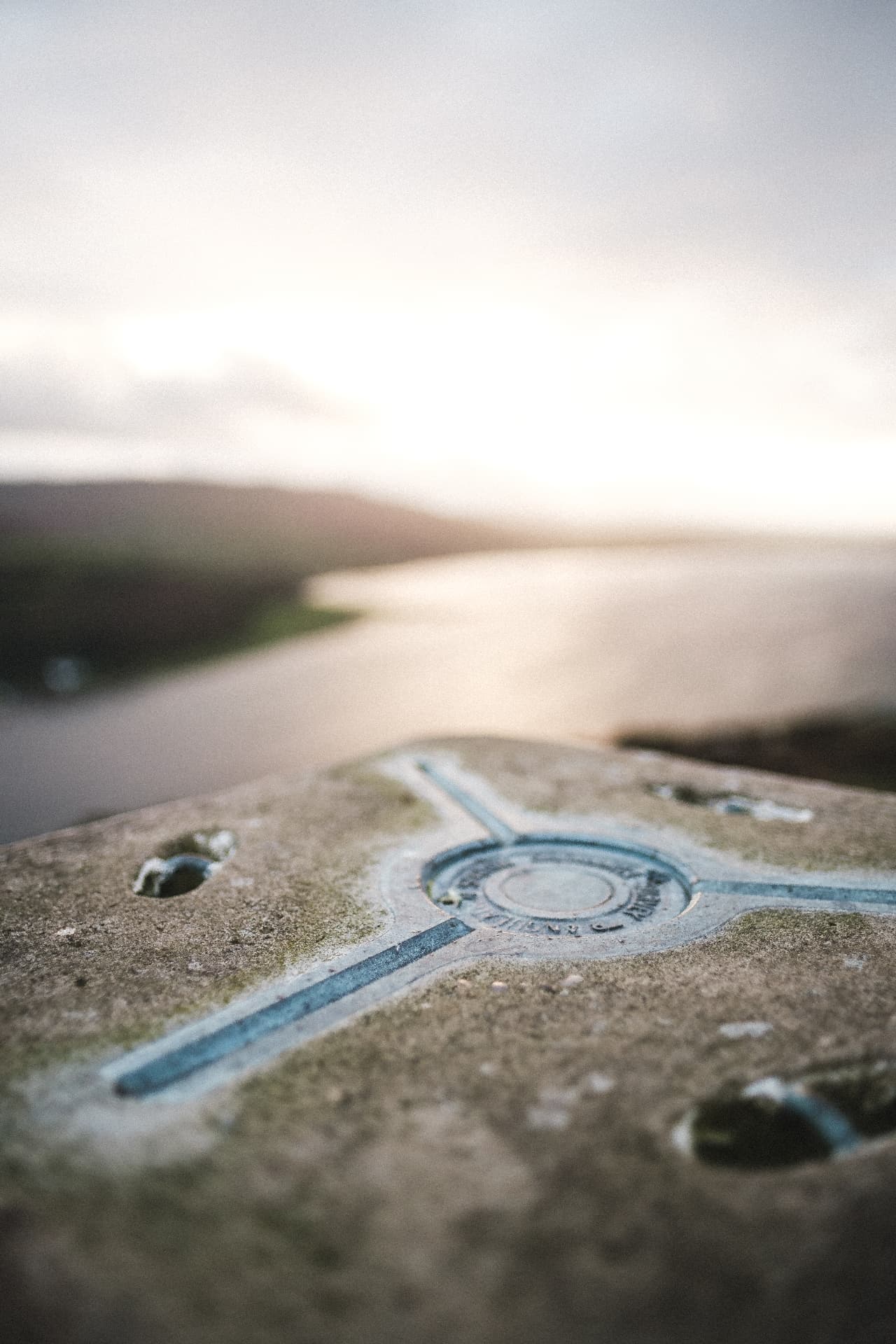 The island's trig point overlooking the sea